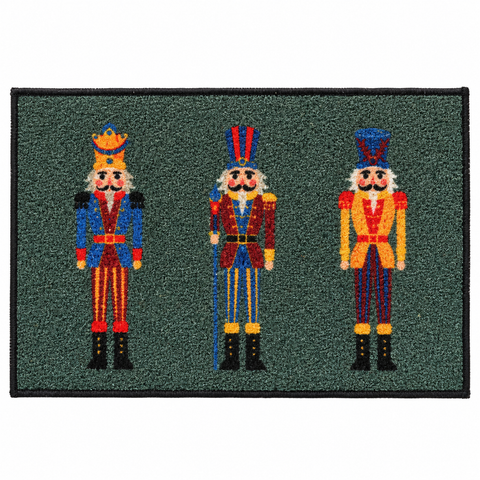 Grüne fussmatte aus nylon 40x60 cm mit drei bunten bestickten nussknackerfiguren in festlicher kleidung