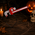 Roter und weißer haarreif in rohrzangendesign mit blutiger detailoptik aus kunststoff für halloween