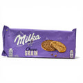 Milka choco grain 126 g schokoladenriegel in lila mit kuhlogo und goldbraunen knusprigen keksen auf der verpackung