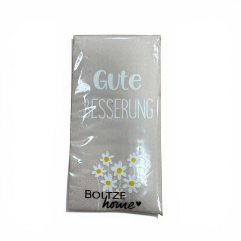 Taschentücher mit spruch beige leinenserviette mit weißen margeriten und gute besserung schrift in grau verpackt