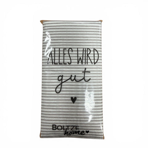 Taschentücher mit spruch featuring a gray and white striped kitchen towel with black cursive text alles wird gut and a small heart in clear plastic packaging