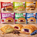 Sechs bunte karuzo gefüllte croissants 82 g in einzelnen aromen wie schokolade pistazie tiramisu erdbeere und kirsche