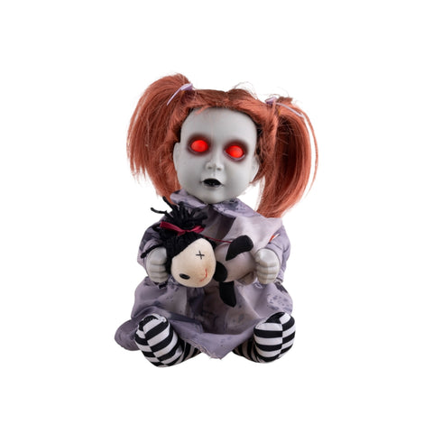 Puppe zerreißt Kuscheltier