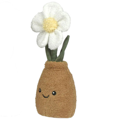 Eine plüschblume im topf mit weißer daffodil und gelbem zentrum in braunem vase mit lächelndem gesicht