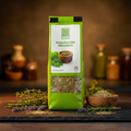 Ein grüner beutel mit kräuter der provence 25g von eco food zeigt getrocknete kräuter durch ein durchsichtiges fenster