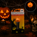 Orange halloween led-flaschenkorken geformt wie ein kürbis mit schwarzem stiel für gruselige ambiance