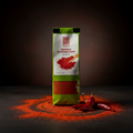 Green and white bag of haco paprika rosenscharf 60g ground spice with red powder and dried chili peppers nearby