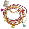 Bunte perlenkette 48 cm mit pinken, orangen, creme und goldenen perlen und passenden quasten in lebendigen farben