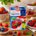 Blau-weiße ruf agartine gelatin substitute box mit beerenfülltem dessert auf der front für veganen gelatineersatz