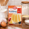Ruf pudding sahne 3x38g in orangeverpackung mit glänzendem gelbem gelatinepudding auf der vorderseite