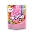 Pink skittles desserts 152g tasche mit regenbogendesign und bunten bonbons schweben darum
