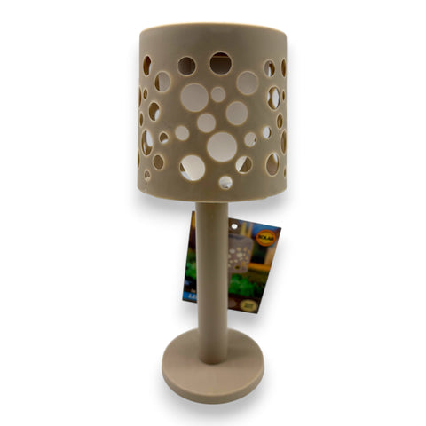 Beige zylindrische solar-tischlampe 9x9x21 cm mit muster aus runden ausschnitten