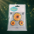 Set of three vibrant yellow orange sunflower shaped mini gardening planters in clear plastic packaging