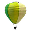 Solar led heißluftballon mit korb flackereffekt in grün lime gelb und creme aus rippenpapier und stoff