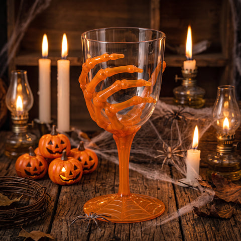 Weinglas skeletthand 18 cm mit orangefarbenem skelettgriff, spinnennetz-fuß und durchsichtigem kunststoff