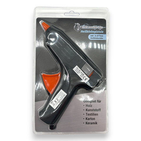 Schwarze und orange titan grip heißklebepistole 40 watt in transparenter kunststoffverpackung