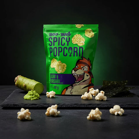 Vibrante grüne tüte boo-yah spicy popcorn mit cartoon-tiger-motiv und mori und wasabi geschmack 80 g