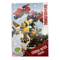 Transformers cookie bites 375g frühstückscereal mit optimus prime und bumblebee vor blaupausenhintergrund